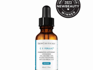 Dark brown glass bottle of SkinCeuticals C E Ferulic, a vitamin C serum for fine lines and wrinkles.